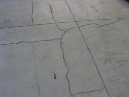 Cracks developed due to expansion of concrete.