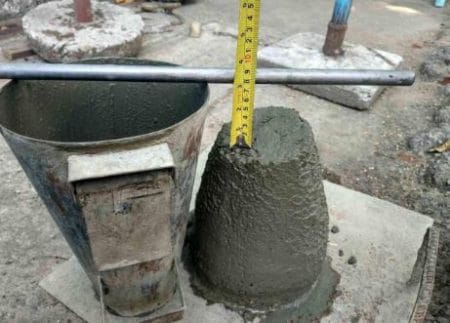slump test on first batch of ready mix concrete
